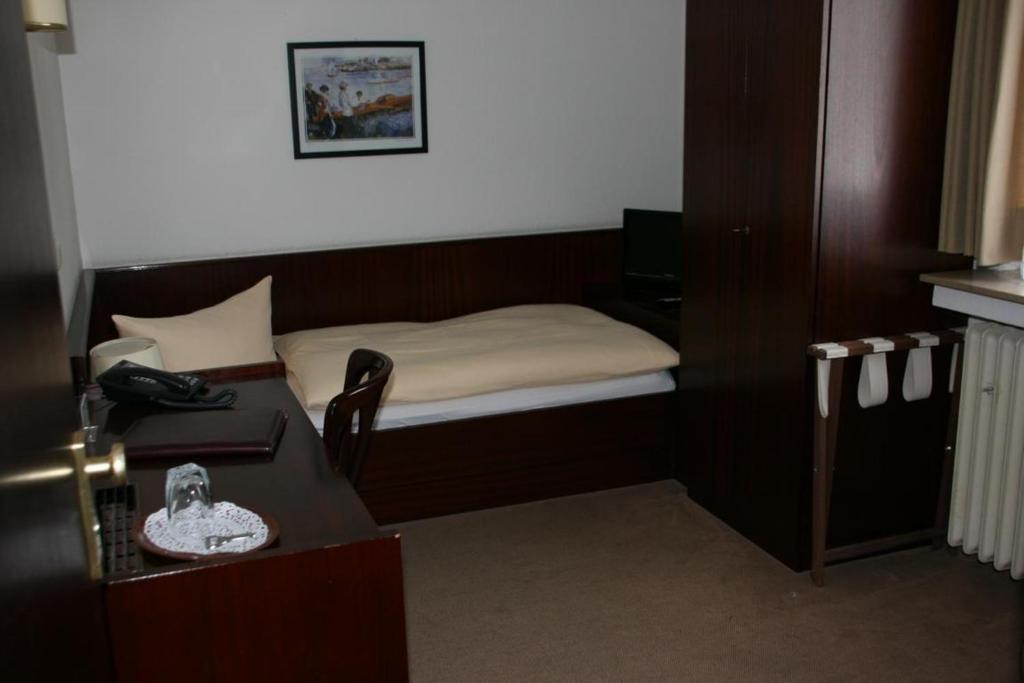 Hotel Diening Essen Habitación foto